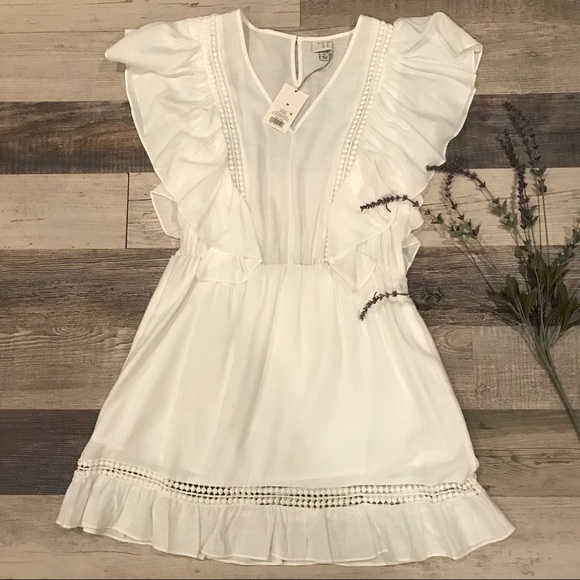 a new day Dresses & Skirts - NWT Boho White Mini Dress